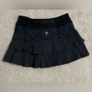 Girls’ Ivivva skort Size 8. Excellent condition. Similar to Lululemon Pace Rival